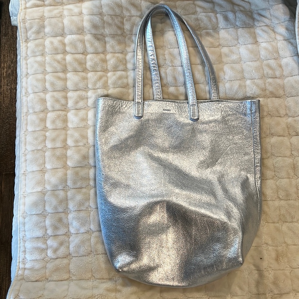 Silver shoulder bag by Baggu. Leather Light weight versatile and ever so soft.